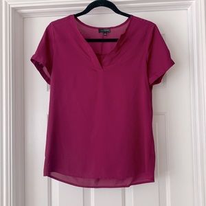 The limited- size small magenta blouse